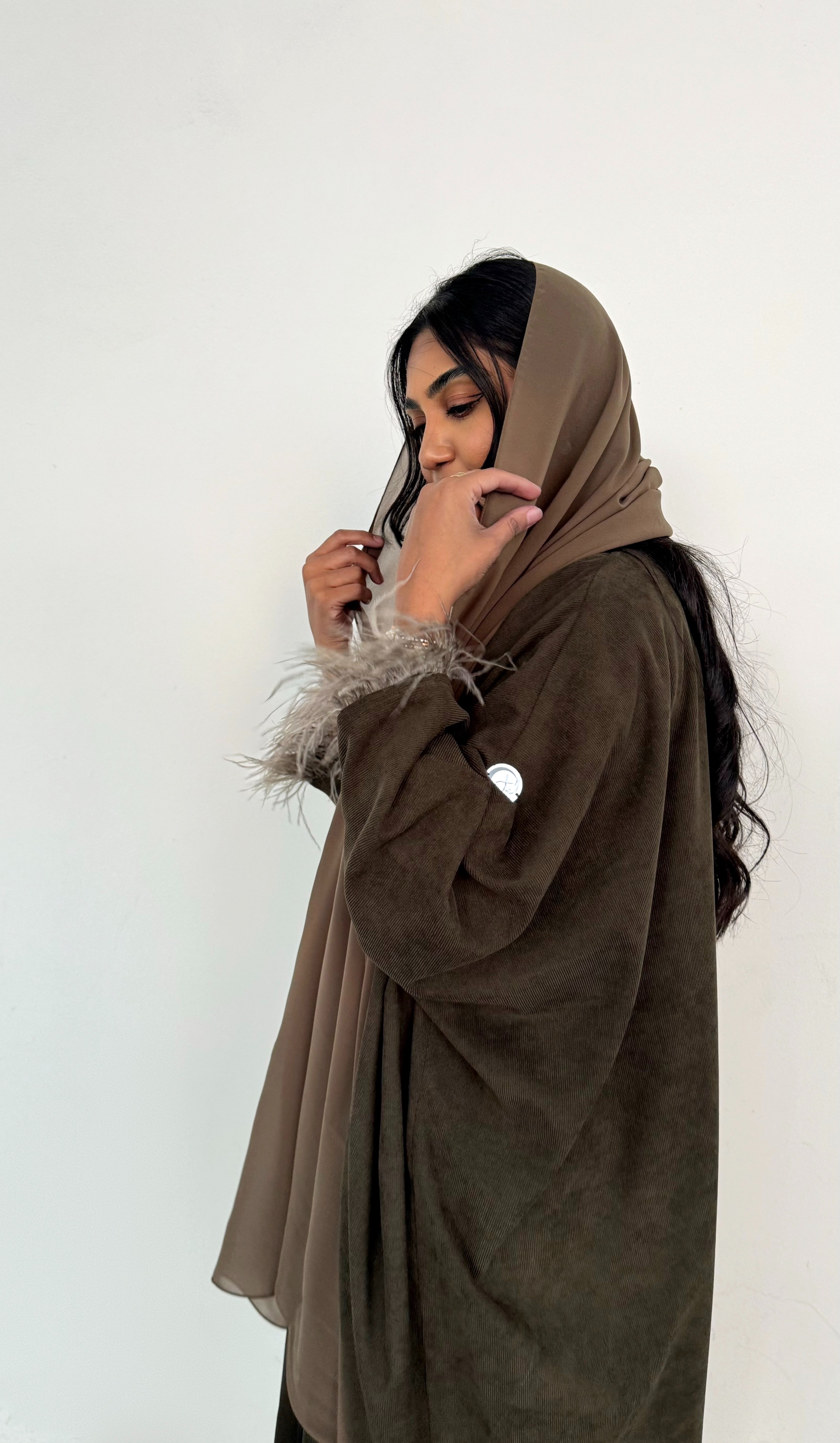 ⁦Olive Feathers⁩ - الصورة ⁦4⁩